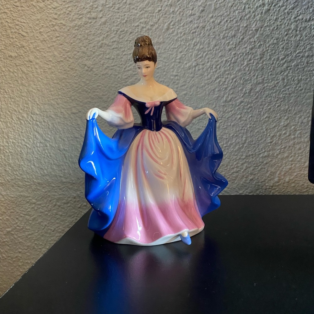 Royal Doulton lady figurine collectible in fine bone china
